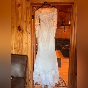 White Casablanca Bridal dress with Veil included. Size 10/12